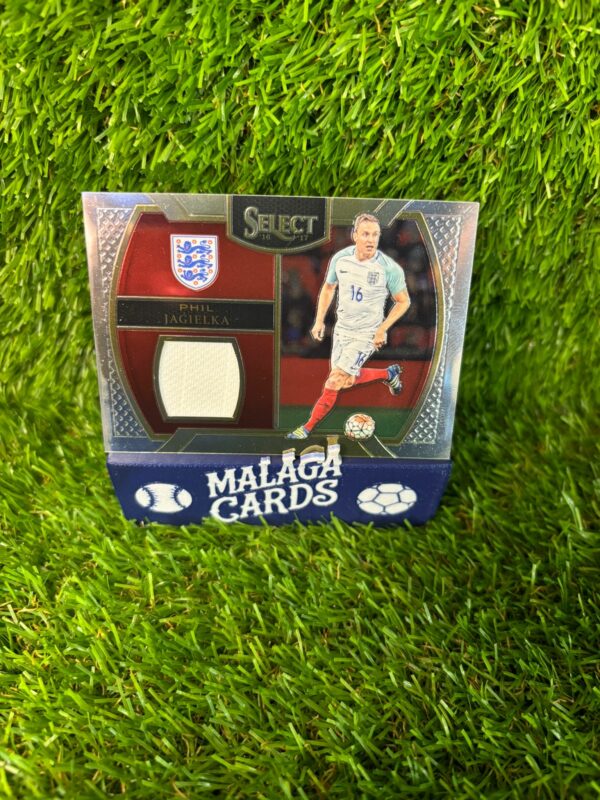 Phil Jagielka - Panini Select 2016-2017 - Patch - Imagen 3